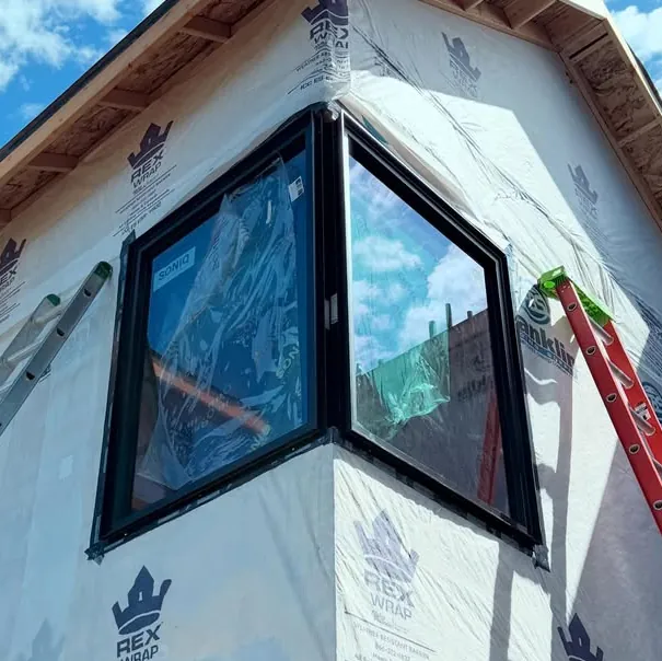 Corner window flashed and sealed into the weather barrier on a new home in Boise, Idaho