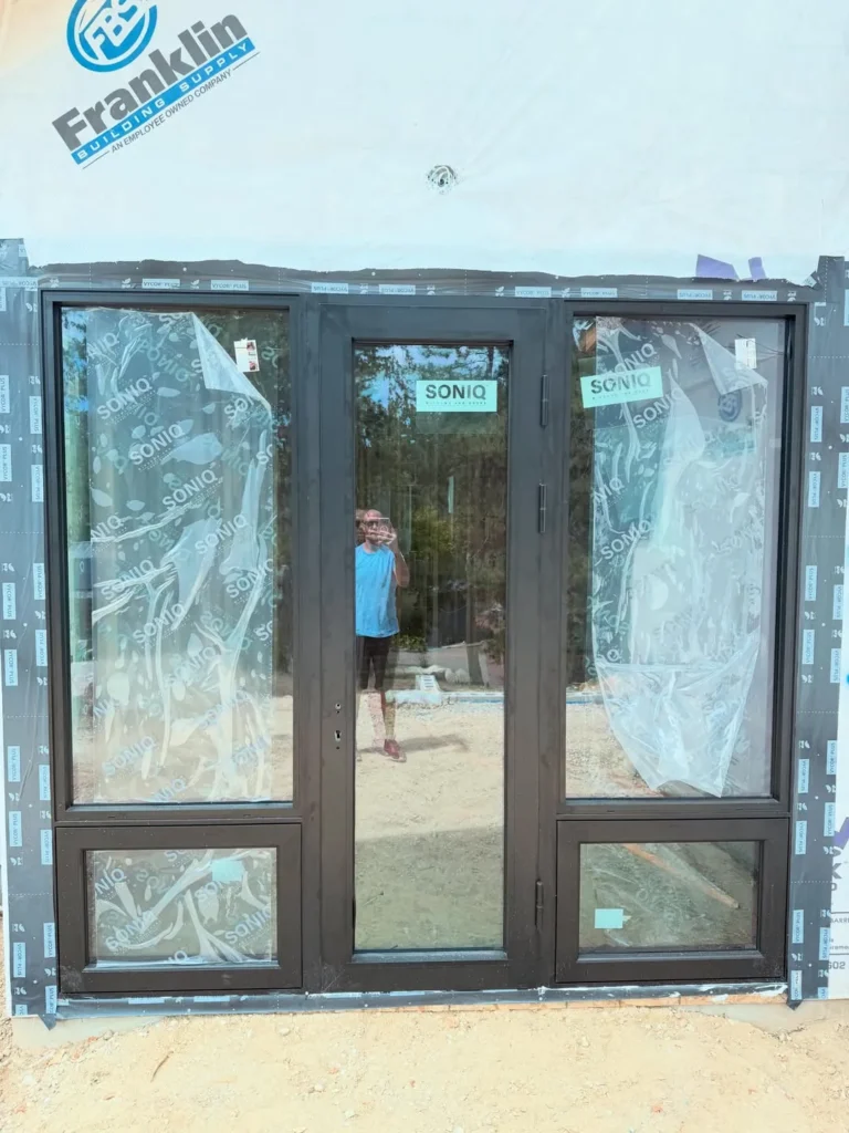 New entry door with sidelights installed and flashed on a home in Boise, Idaho