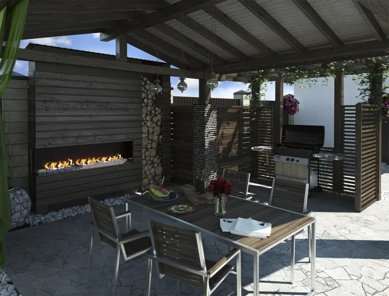 Covered outdoor kitchen and dining area with a grill, linear fireplace and timber-framed roof, outdoor kitchens in Boise, Idaho